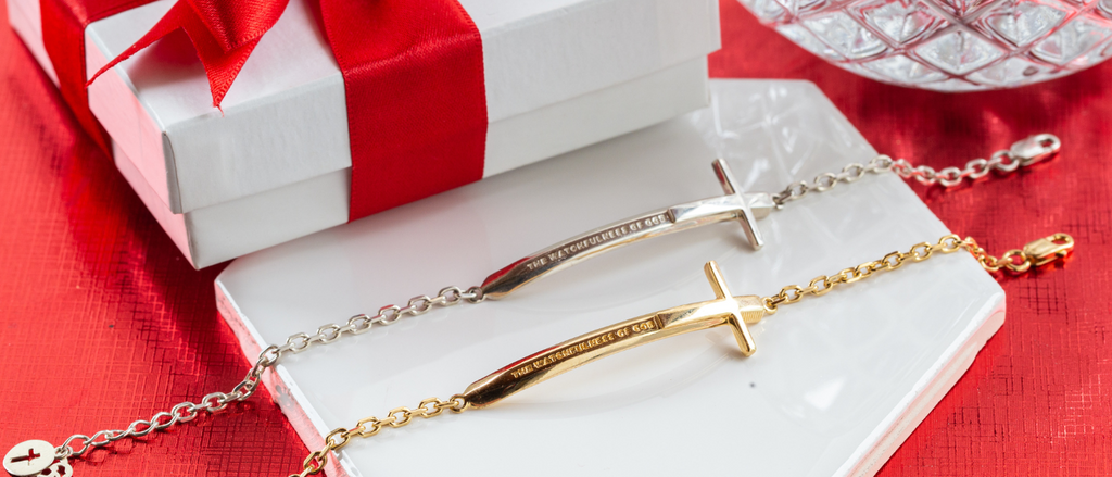 Christian bracelets in sterling silver on a Christmas background