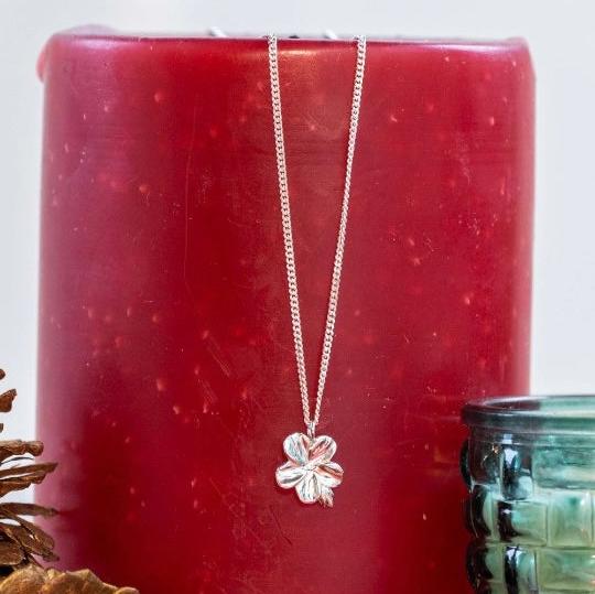 “Christian almond blossom necklace inspired by scripture.”
