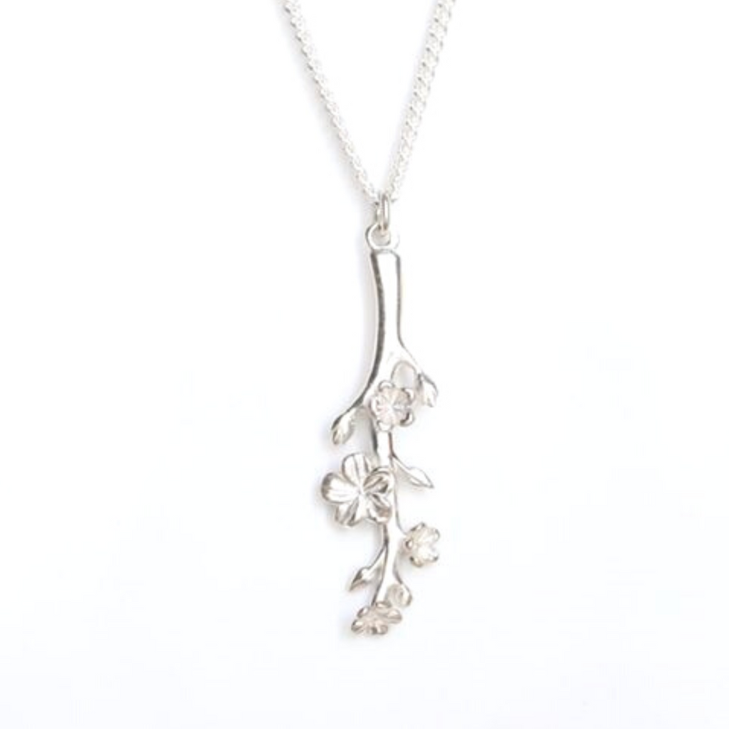 Our Esther Christian necklace the branch of an almond tree in sterling silver on a white background